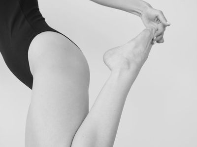 Dynamic movement of a person stretching their arms.